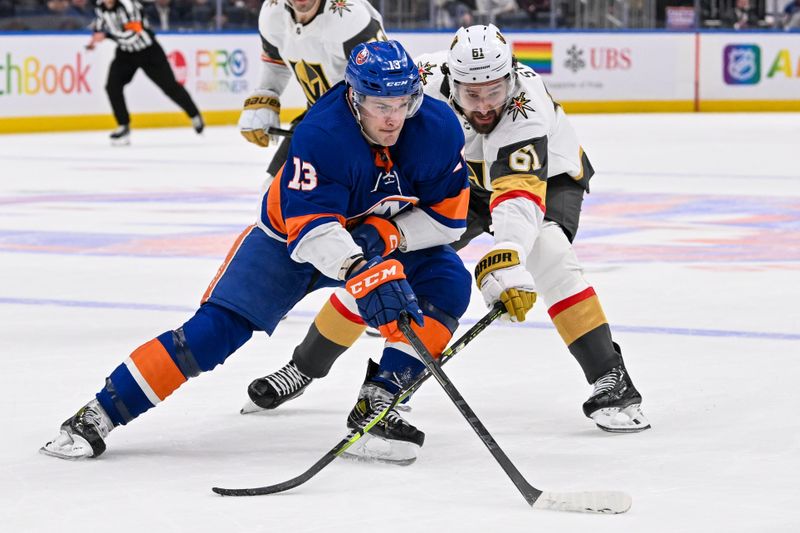 Jan 23, 2024; Elmont, New York, USA;  New York Islanders center Mathew Barzal (13) skates with the puck defended by Vegas Golden Knights right wing Mark Stone (61) during the second period at UBS Arena. Mandatory Credit: Dennis Schneidler-USA TODAY Sports