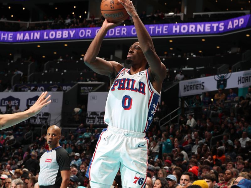 CHARLOTTE, NC - DECEMBER 3: Tyrese Maxey #0 of the Philadelphia 76ers shoots a three point basket during the game against the Charlotte Hornets during an NBA Emirates Cup game on December 3, 2024 at Spectrum Center in Charlotte, North Carolina. NOTE TO USER: User expressly acknowledges and agrees that, by downloading and or using this photograph, User is consenting to the terms and conditions of the Getty Images License Agreement. Mandatory Copyright Notice: Copyright 2024 NBAE (Photo by Kent Smith/NBAE via Getty Images)