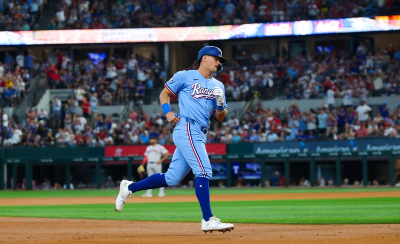 Aug 4, 2024; Arlington, Texas, USA; Texas Rangers designated hitter Josh Jung (6) runs the bases after hitting a home run during the second inning against the Boston Red Sox at Globe Life Field. Mandatory Credit: Kevin Jairaj-USA TODAY Sports