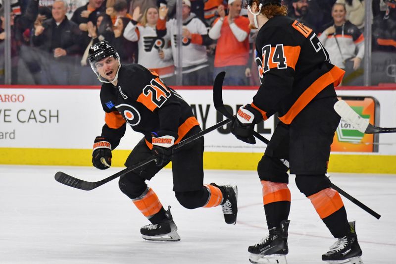 Mar 19, 2024; Philadelphia, Pennsylvania, USA; Philadelphia Flyers center Scott Laughton (21) skates back to the bench after scoring a goal against the Toronto Maple Leafs during the third period at Wells Fargo Center. Mandatory Credit: Eric Hartline-USA TODAY Sports