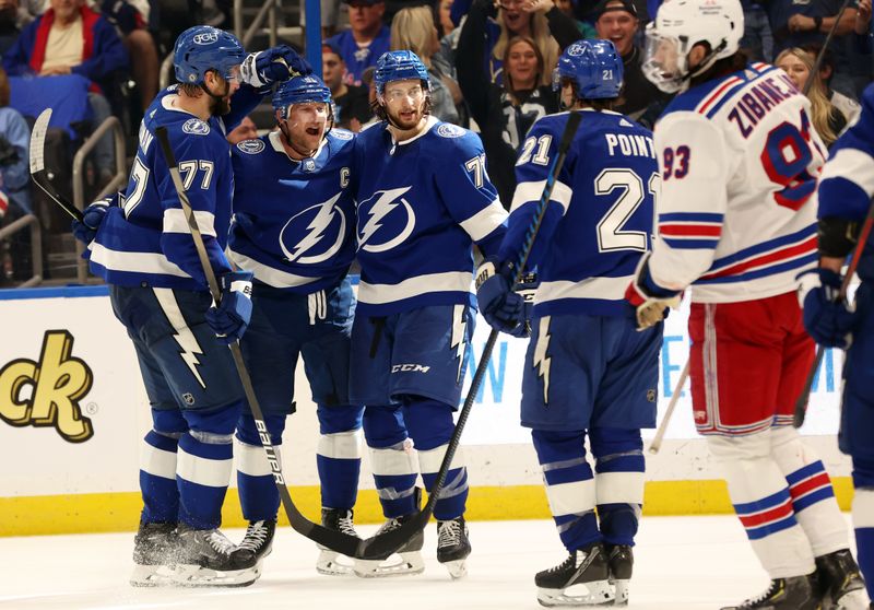 Mar 14, 2024; Tampa, Florida, USA; Tampa Bay Lightning center Steven Stamkos (91) celebrates after he scores a goal against the New York Rangers during the third period at Amalie Arena. Mandatory Credit: Kim Klement Neitzel-USA TODAY Sports