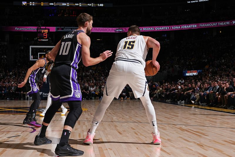 DENVER, CO - FEBRUARY 28: Nikola Jokic #15 of the Denver Nuggets handles the ball during the game against the Sacramento Kings on February 28, 2024 at the Ball Arena in Denver, Colorado. NOTE TO USER: User expressly acknowledges and agrees that, by downloading and/or using this Photograph, user is consenting to the terms and conditions of the Getty Images License Agreement. Mandatory Copyright Notice: Copyright 2024 NBAE (Photo by Garrett Ellwood/NBAE via Getty Images)