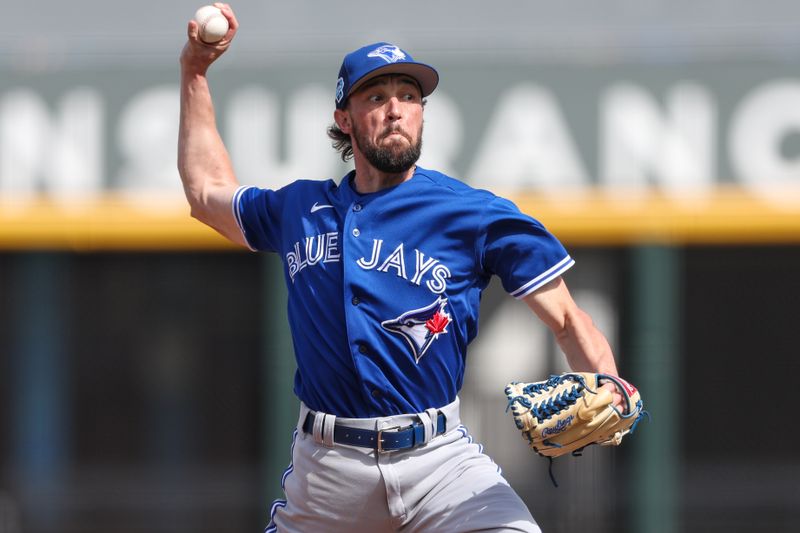 Feb 27, 2023; North Port, Florida, USA;  Toronto Blue Jays pitcher Casey Lawrence (62) throws a pitch against the Atlanta Braves in the fifth inning during spring training at CoolToday Park. Mandatory Credit: Nathan Ray Seebeck-USA TODAY Sports