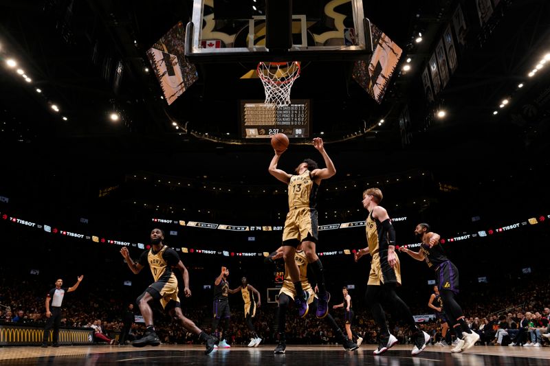 TORONTO, CANADA - APRIL 2: Jordan Nwora #13 of the Toronto Raptors goes up for the rebound during the game against the Los Angeles Lakers on April 2, 2024 at the Scotiabank Arena in Toronto, Ontario, Canada.  NOTE TO USER: User expressly acknowledges and agrees that, by downloading and or using this Photograph, user is consenting to the terms and conditions of the Getty Images License Agreement.  Mandatory Copyright Notice: Copyright 2024 NBAE (Photo by Mark Blinch/NBAE via Getty Images)