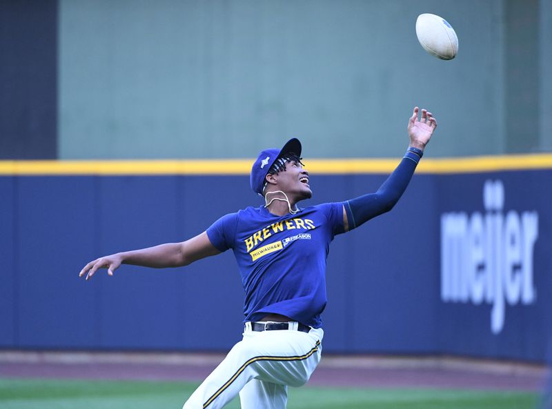 Oct 3, 2023; Milwaukee, Wisconsin, USA; Milwaukee Brewers relief pitcher Abner Uribe (45) warms up playing catch before their game against the Arizona Diamondbacks during game one of the Wildcard series for the 2023 MLB playoffs at American Family Field. Mandatory Credit: Michael McLoone-USA TODAY Sports