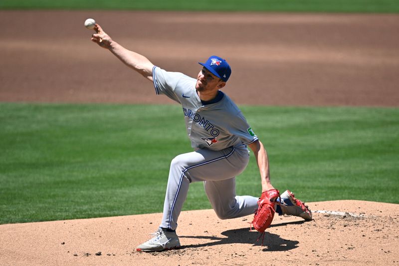 Apr 21, 2024; San Diego, California, USA; Toronto Blue Jays starting pitcher Chris Bassitt (40) throws a pitch against the San Diego Padres during the first inning at Petco Park. Mandatory Credit: Orlando Ramirez-USA TODAY Sports