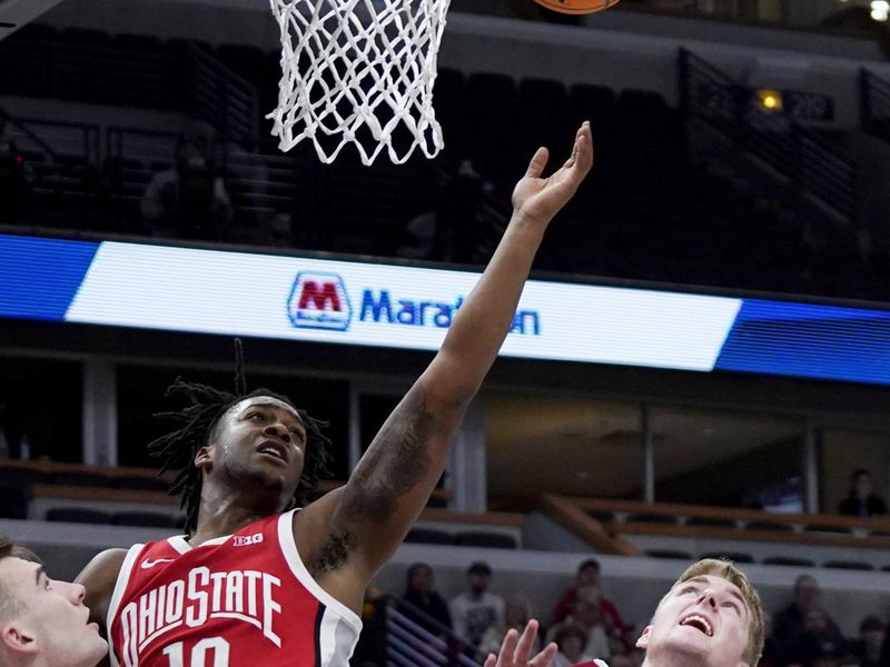 Mar 8, 2023; Chicago, IL, USA; Ohio State Buckeyes forward Brice Sensabaugh (10) and Wisconsin Badgers forward Steven Crowl (22) go for a rebound during the first half at United Center. Mandatory Credit: David Banks-USA TODAY Sports