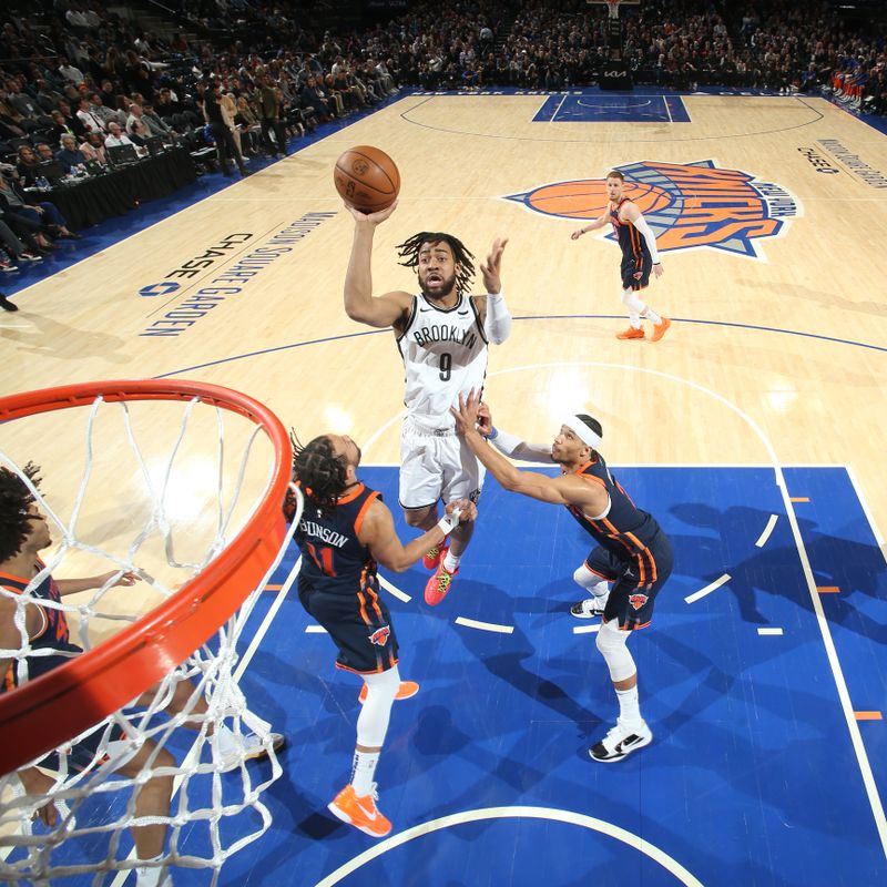 NEW YORK, NY - APRIL 12: Trendon Watford #9 of the Brooklyn Nets drives to the basket during the game against the New York Knicks on April 12, 2024 at Madison Square Garden in New York City, New York.  NOTE TO USER: User expressly acknowledges and agrees that, by downloading and or using this photograph, User is consenting to the terms and conditions of the Getty Images License Agreement. Mandatory Copyright Notice: Copyright 2024 NBAE  (Photo by Nathaniel S. Butler/NBAE via Getty Images)