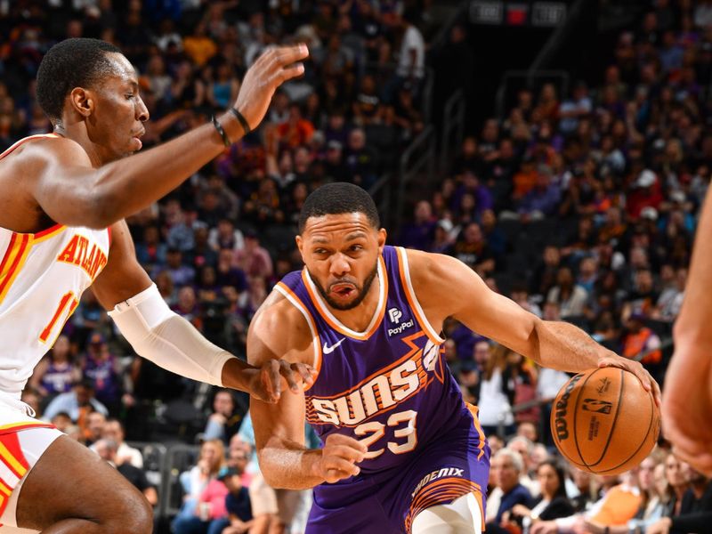 PHOENIX, AZ - MARCH 21:  Eric Gordon #23 of the Phoenix Suns goes to the basket during the game on March 21, 2024 at Footprint Center in Phoenix, Arizona. NOTE TO USER: User expressly acknowledges and agrees that, by downloading and or using this photograph, user is consenting to the terms and conditions of the Getty Images License Agreement. Mandatory Copyright Notice: Copyright 2024 NBAE (Photo by Barry Gossage/NBAE via Getty Images)