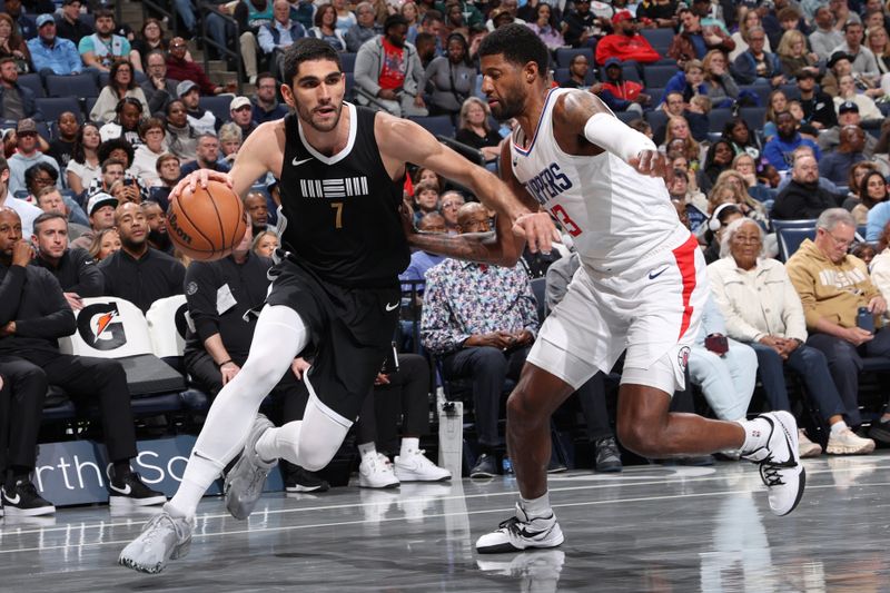 MEMPHIS, TN - FEBRUARY 23: Santi Aldama #7 of the Memphis Grizzlies dribbles the ball during the game against the LA Clippers on February 23, 2024 at FedExForum in Memphis, Tennessee. NOTE TO USER: User expressly acknowledges and agrees that, by downloading and or using this photograph, User is consenting to the terms and conditions of the Getty Images License Agreement. Mandatory Copyright Notice: Copyright 2024 NBAE (Photo by Joe Murphy/NBAE via Getty Images)