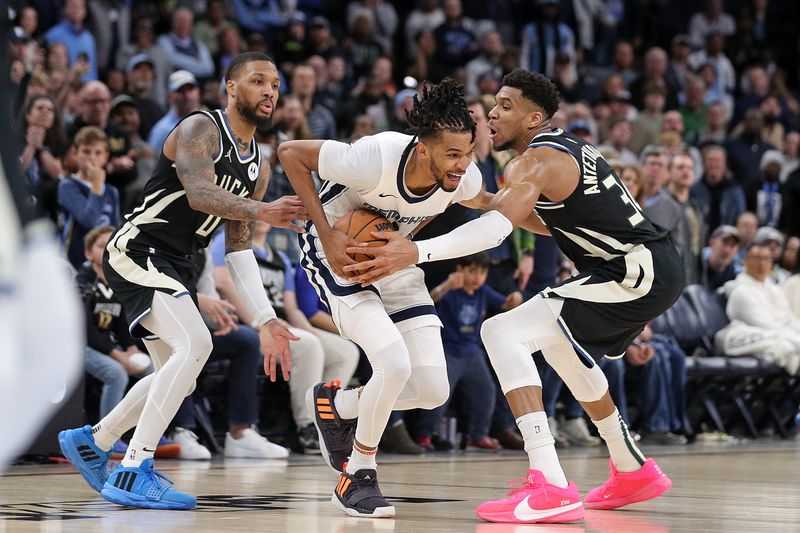 MEMPHIS, TENNESSEE - FEBRUARY 15: Ziaire Williams #8 of the Memphis Grizzlies handles the ball against Damian Lillard #0 of the Milwaukee Bucks and Giannis Antetokounmpo #34 of the Milwaukee Bucks during the second half at FedExForum on February 15, 2024 in Memphis, Tennessee. NOTE TO USER: User expressly acknowledges and agrees that, by downloading and or using this photograph, User is consenting to the terms and conditions of the Getty Images License Agreement. (Photo by Justin Ford/Getty Images)