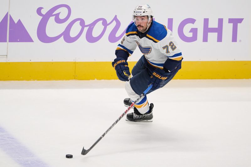 Nov 16, 2023; San Jose, California, USA; St. Louis Blues defenseman Justin Faulk (72) skates with the puck against the San Jose Sharks during the third period at SAP Center at San Jose. Mandatory Credit: Robert Edwards-USA TODAY Sports