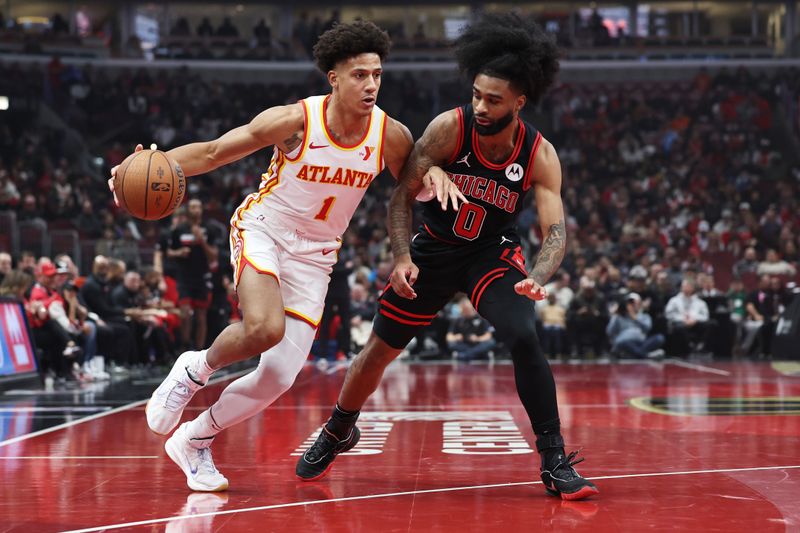 CHICAGO, ILLINOIS - NOVEMBER 22: Jalen Johnson #1 of the Atlanta Hawks dribbles against Coby White #0 of the Chicago Bulls during the first quarter of the Emirates NBA Cup at the United Center on November 22, 2024 in Chicago, Illinois. NOTE TO USER: User expressly acknowledges and agrees that, by downloading and or using this photograph, User is consenting to the terms and conditions of the Getty Images License Agreement. (Photo by Geoff Stellfox/Getty Images)