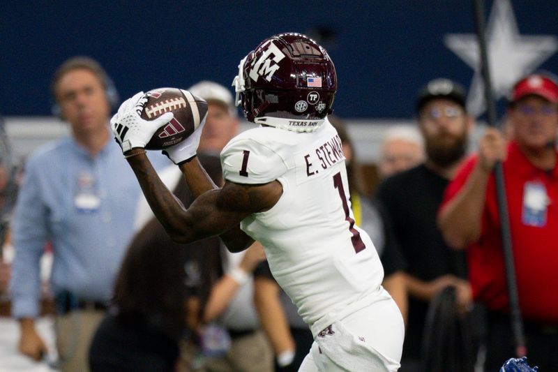 Sep 30, 2023; Arlington, Texas, USA; Texas A&M Aggies wide receiver Evan Stewart (1) catches a pass for a touchdown against the Arkansas Razorbacks during the first half at AT&T Stadium. Mandatory Credit: Jerome Miron-USA TODAY Sports