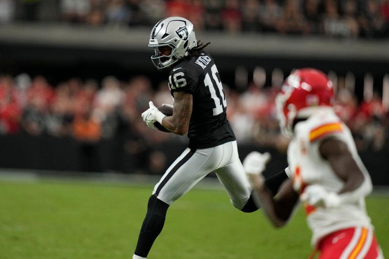 Las Vegas Raiders wide receiver Jakobi Meyers catches a pass during the second half of an NFL football game against the Kansas City Chiefs Sunday, Oct. 27, 2024, in Las Vegas. (AP Photo/John Locher)