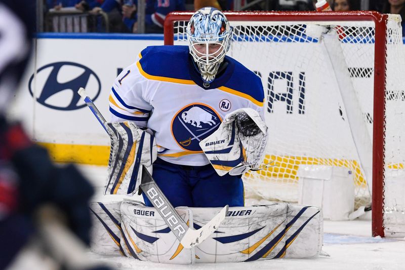 Dec 23, 2023; New York, New York, USA; Buffalo Sabres goaltender Ukko-Pekka Luukkonen (1) makes a save e against the New York Rangers during the third period at Madison Square Garden. Mandatory Credit: Dennis Schneidler-USA TODAY Sports