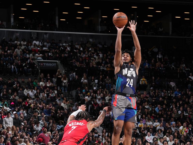 BROOKLYN, NY - JANUARY 27: Cam Thomas #24 of the Brooklyn Nets shoots a three point basket against the Houston Rockets on January 27, 2024 at Barclays Center in Brooklyn, New York. NOTE TO USER: User expressly acknowledges and agrees that, by downloading and or using this Photograph, user is consenting to the terms and conditions of the Getty Images License Agreement. Mandatory Copyright Notice: Copyright 2024 NBAE (Photo by Jesse D. Garrabrant/NBAE via Getty Images)