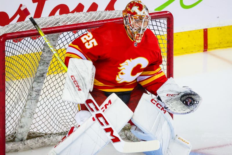 Feb 17, 2024; Calgary, Alberta, CAN; Calgary Flames goaltender Jacob Markstrom (25) guards his net during the warmup period against the Detroit Red Wings at Scotiabank Saddledome. Mandatory Credit: Sergei Belski-USA TODAY Sports