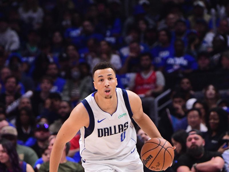 LOS ANGELES, CA - APRIL 21:  Dante Exum #0 of the Dallas Mavericks handles the ball during the game against the LA Clippers during Round 1 Game 1 of the 2024 NBA Playoffs on April 21, 2024 at Crypto.Com Arena in Los Angeles, California. NOTE TO USER: User expressly acknowledges and agrees that, by downloading and/or using this Photograph, user is consenting to the terms and conditions of the Getty Images License Agreement. Mandatory Copyright Notice: Copyright 2024 NBAE (Photo by Adam Pantozzi/NBAE via Getty Images)