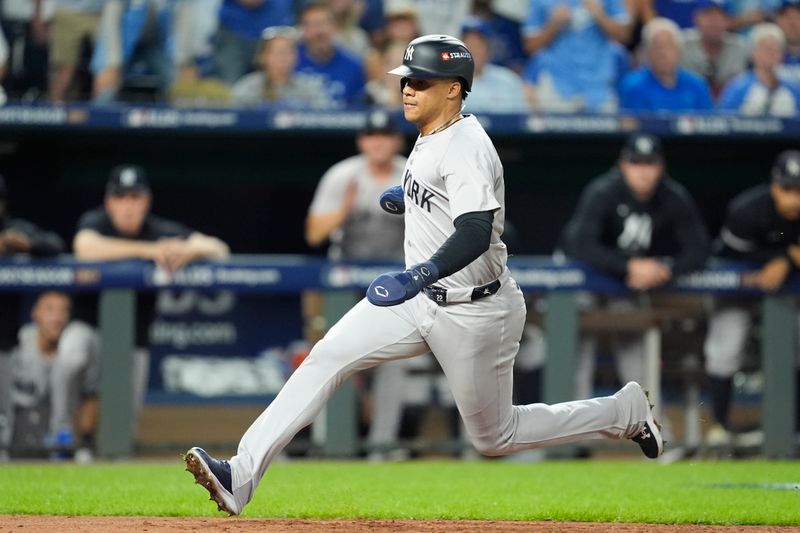 Oct 9, 2024; Kansas City, Missouri, USA; New York Yankees outfielder Juan Soto (22) scores run in the fourth inning against the Kansas City Royals during game three of the NLDS for the 2024 MLB Playoffs at Kauffman Stadium. Mandatory Credit: Jay Biggerstaff -Imagn Images