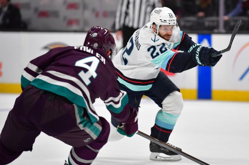 Apr 5, 2024; Anaheim, California, USA; Seattle Kraken right wing Oliver Bjorkstrand (22) shoots on goal against Anaheim Ducks defenseman Cam Fowler (4) during the first period at Honda Center. Mandatory Credit: Gary A. Vasquez-USA TODAY Sports