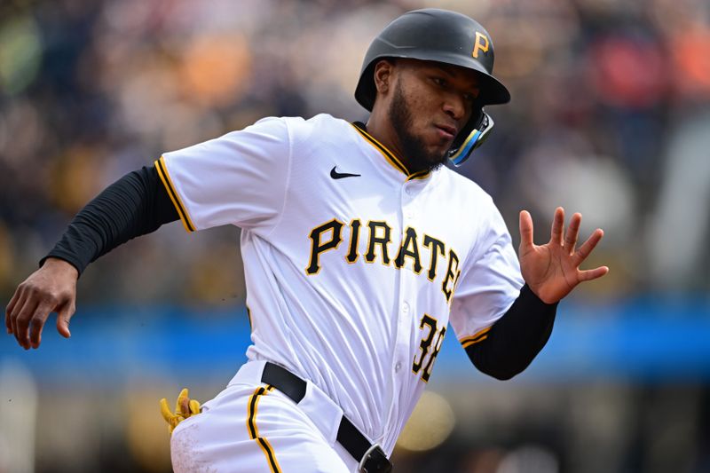 Apr 6, 2024; Pittsburgh, Pennsylvania, USA; Pittsburgh Pirates outfielder Edward Olivares (38) scores a run against the Baltimore Orioles during the second inning at PNC Park. Mandatory Credit: David Dermer-USA TODAY Sports