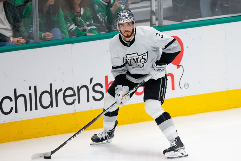 Mar 16, 2024; Dallas, Texas, USA; Los Angeles Kings defenseman Matt Roy (3) handles the puck during the third period against the Dallas Stars at American Airlines Center. Mandatory Credit: Andrew Dieb-USA TODAY Sports