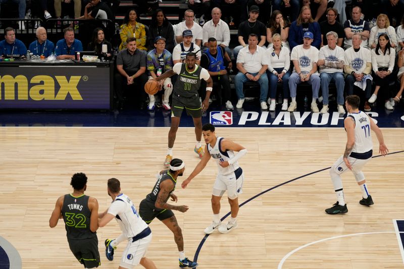 MINNEAPOLIS, MN - MAY 30: Naz Reid #11 of the Minnesota Timberwolves dribbles the ball during the game against the Dallas Mavericks during Game 5 of the Western Conference Finals of the 2024 NBA Playoffs on May 30, 2024 at Target Center in Minneapolis, Minnesota. NOTE TO USER: User expressly acknowledges and agrees that, by downloading and or using this Photograph, user is consenting to the terms and conditions of the Getty Images License Agreement. Mandatory Copyright Notice: Copyright 2024 NBAE (Photo by Jordan Johnson/NBAE via Getty Images)