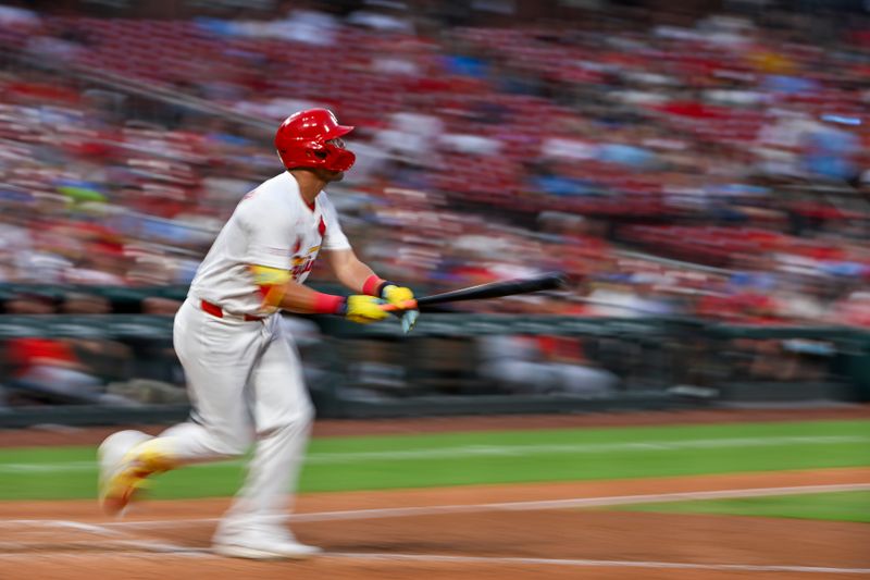 Jul 10, 2025; St. Louis, Missouri, USA;  St. Louis Cardinals left fielder Lars Nootbaar (21) runs down the line after hitting a double against the Washington Nationals during the sixth inning at Busch Stadium. Mandatory Credit: Jeff Curry-Imagn Images