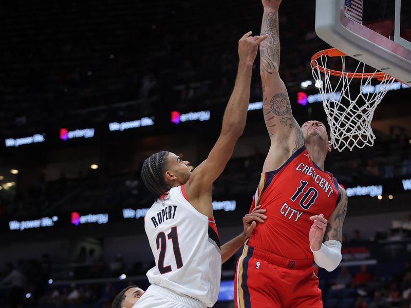 NEW ORLEANS, LOUISIANA - NOVEMBER 04: Daniel Theis #10 of the New Orleans Pelicans blocks a shot from Rayan Rupert #21 of the Portland Trail Blazers during the first half at Smoothie King Center on November 04, 2024 in New Orleans, Louisiana. NOTE TO USER: User expressly acknowledges and agrees that, by downloading and or using this Photograph, user is consenting to the terms and conditions of the Getty Images License Agreement. (Photo by Jonathan Bachman/Getty Images)