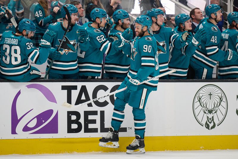 Dec 12, 2023; San Jose, California, USA; San Jose Sharks right wing Justin Bailey (90) shakes hands with his teammates on the bench after scoring a goal against the Winnipeg Jets during the first period at SAP Center at San Jose. Mandatory Credit: Robert Edwards-USA TODAY Sports