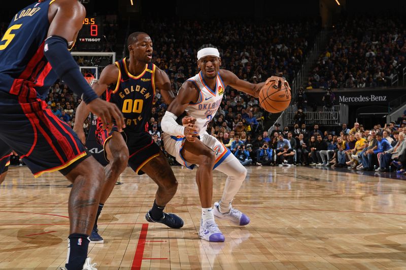 SAN FRANCISCO, CA - NOVEMBER 27: Shai Gilgeous-Alexander #2 of the Oklahoma City Thunder dribbles the ball during the game against the Golden State Warriors on November 27, 2024 at Chase Center in San Francisco, California. NOTE TO USER: User expressly acknowledges and agrees that, by downloading and or using this photograph, user is consenting to the terms and conditions of Getty Images License Agreement. Mandatory Copyright Notice: Copyright 2024 NBAE (Photo by Noah Graham/NBAE via Getty Images)