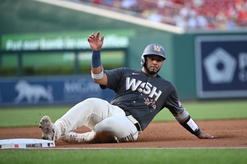Jul 5, 2024; Washington, District of Columbia, USA; Washington Nationals catcher Keibert Ruiz (20) slides into third base against the St. Louis Cardinals during the first inning at Nationals Park. Mandatory Credit: Rafael Suanes-USA TODAY Sports