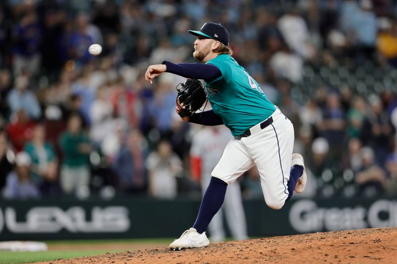 Jun 1, 2024; Seattle, Washington, USA; Seattle Mariners pitcher Kirby Snead (43) throws against the Los Angeles Angels during the ninth inning at T-Mobile Park. Mandatory Credit: John Froschauer-USA TODAY Sports