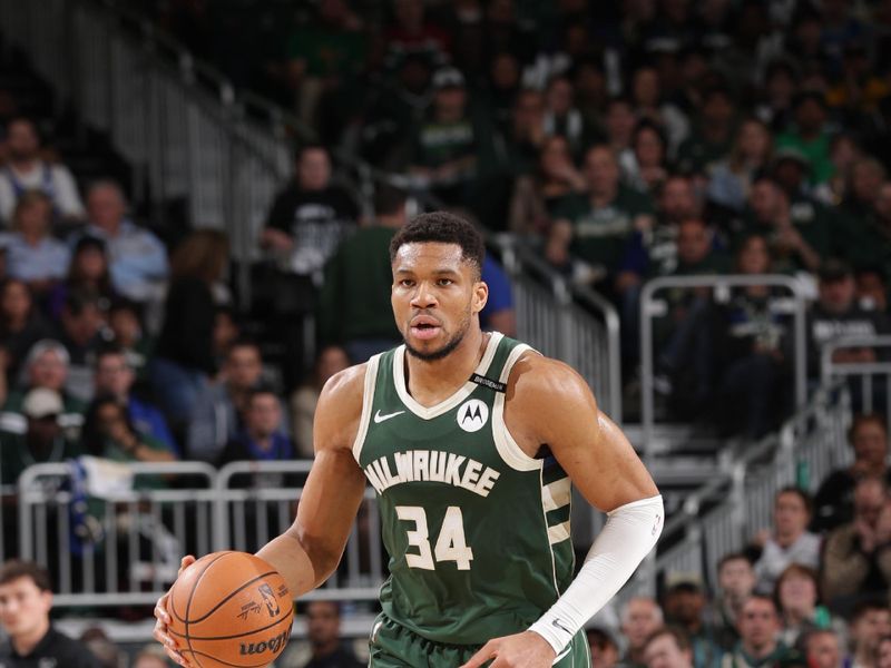 MILWAUKEE, WI - APRIL  25: Giannis Antetokounmpo #34 of the Milwaukee Bucks dribbles the ball during the game against the Indiana Pacers  during Round 1 Game 3 of the 2025 NBA Playoffs on April 25, 2025 at Fiserv Forum Center in Milwaukee, Wisconsin. NOTE TO USER: User expressly acknowledges and agrees that, by downloading and or using this Photograph, user is consenting to the terms and conditions of the Getty Images License Agreement. Mandatory Copyright Notice: Copyright 2025 NBAE (Photo by Gary Dineen/NBAE via Getty Images).