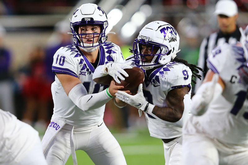 Nov 2, 2023; Lubbock, Texas, USA; Texas Christian Horned Frogs quarterback Josh Hoover (10) hands the ball in the first half to running back Emani Bailey (9) in the game against the Texas Tech Red Raiders at Jones AT&T Stadium and Cody Campbell Field. Mandatory Credit: Michael C. Johnson-USA TODAY Sports