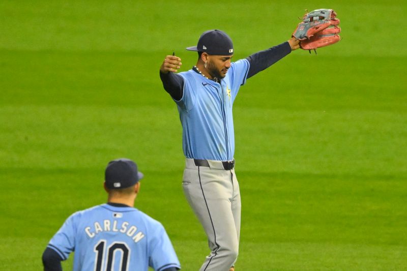 Sep 13, 2024; Cleveland, Ohio, USA; Tampa Bay Rays center fielder Jose Siri (22) celebrates a win over the Cleveland Guardians at Progressive Field. Mandatory Credit: David Richard-Imagn Images