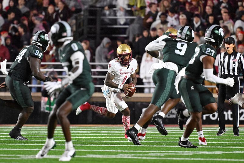 Sep 21, 2024; Chestnut Hill, Massachusetts, USA; Boston College Eagles quarterback Thomas Castellanos (1) scrambles out of the pocket during the first half against the Michigan State Spartans at Alumni Stadium. Mandatory Credit: Eric Canha-Imagn Images