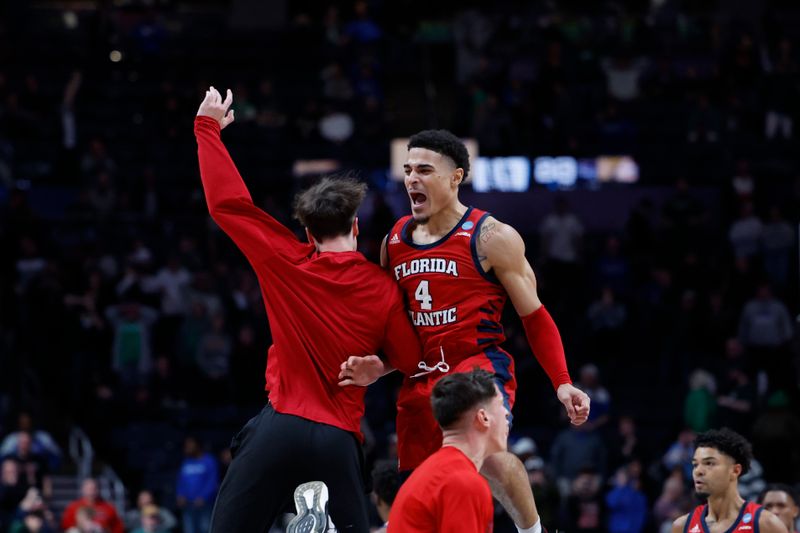 Mar 17, 2023; Columbus, OH, USA; Florida Atlantic Owls guard Bryan Greenlee (4) celebrates defeating the Memphis Tigers at Nationwide Arena. Mandatory Credit: Rick Osentoski-USA TODAY Sports