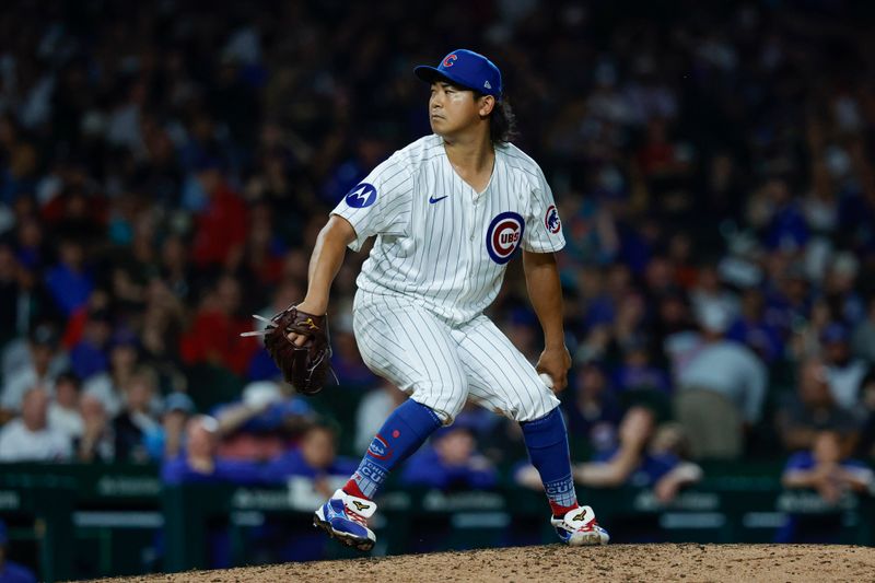 Aug 1, 2024; Chicago, Illinois, USA; Chicago Cubs starting pitcher Shota Imanaga (18) delivers a pitch against the St. Louis Cardinals during the seventh inning at Wrigley Field. Mandatory Credit: Kamil Krzaczynski-USA TODAY Sports