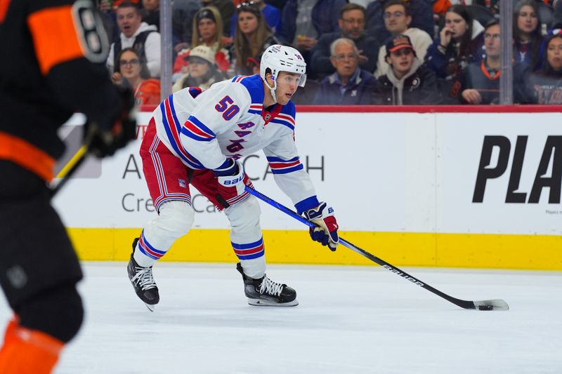 Nov 29, 2024; Philadelphia, Pennsylvania, USA; New York Rangers left wing Will Cuylle (50) controls the puck against the Philadelphia Flyers in the second period at Wells Fargo Center. Mandatory Credit: Kyle Ross-Imagn Images