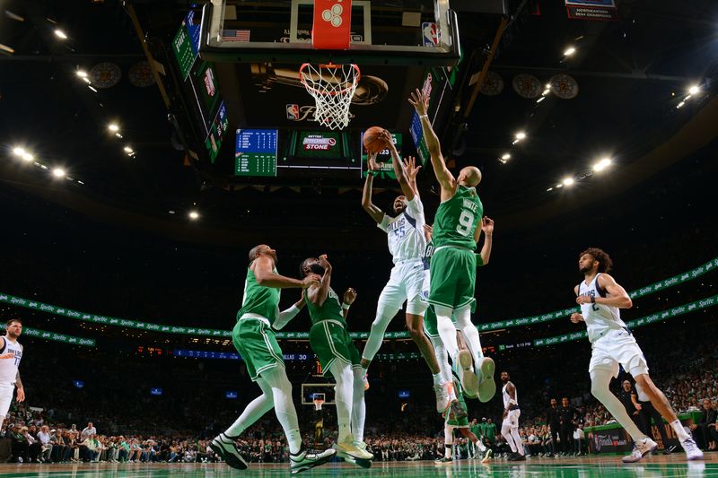 BOSTON, MA - JUNE 17: Derrick Jones Jr. #55 of the Dallas Mavericks drives to the basket during the game against the Boston Celtics during Game 5 of the 2024 NBA Finals on June 17, 2024 at the TD Garden in Boston, Massachusetts. NOTE TO USER: User expressly acknowledges and agrees that, by downloading and or using this photograph, User is consenting to the terms and conditions of the Getty Images License Agreement. Mandatory Copyright Notice: Copyright 2024 NBAE  (Photo by Brian Babineau/NBAE via Getty Images)