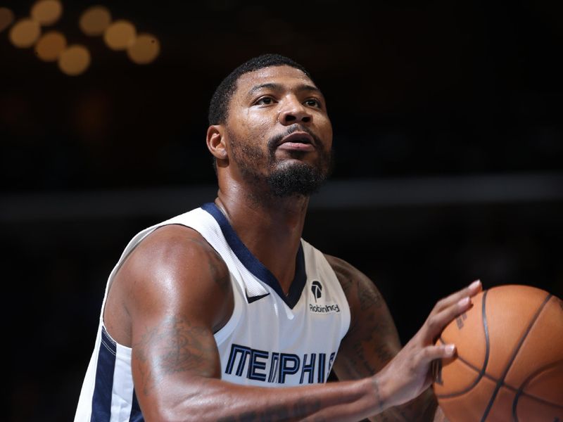 MEMPHIS, TN - OCTOBER 10: Marcus Smart #36 of the Memphis Grizzlies shoots a free throw during the game against the Charlotte Hornets during a NBA Preseason game on October 10, 2024 at FedExForum in Memphis, Tennessee. NOTE TO USER: User expressly acknowledges and agrees that, by downloading and or using this photograph, User is consenting to the terms and conditions of the Getty Images License Agreement. Mandatory Copyright Notice: Copyright 2024 NBAE (Photo by Joe Murphy/NBAE via Getty Images)