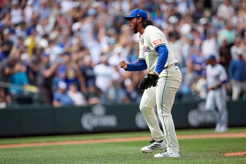 Aug 3, 2025; Seattle, Washington, USA; Seattle Mariners pitcher Andrés Muñoz (75) reacts after the filan out against the Texas Rangers at T-Mobile Park. Mandatory Credit: John Froschauer-Imagn Images