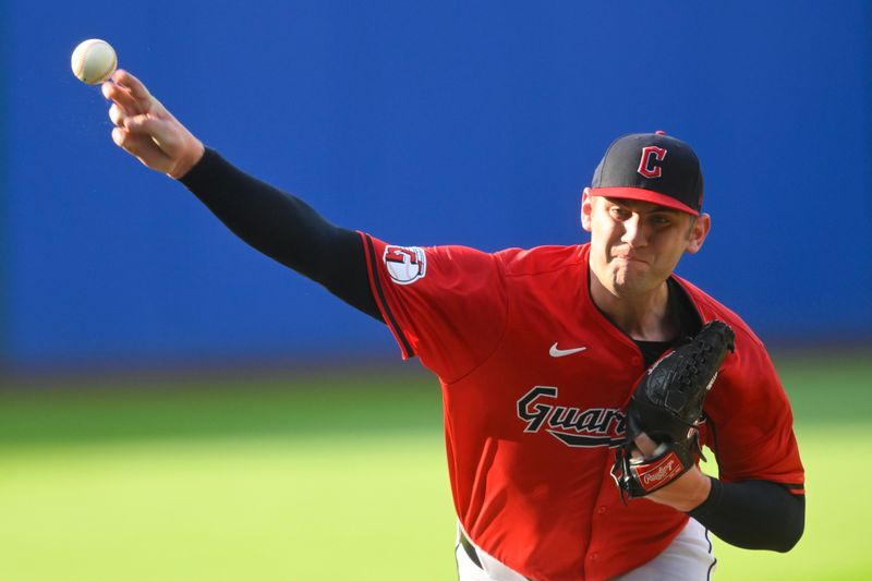 Jul 3, 2024; Cleveland, Ohio, USA; Cleveland Guardians starting pitcher Gavin Williams (32) delivers a pitch in the first inning against the Chicago White Sox at Progressive Field. Mandatory Credit: David Richard-USA TODAY Sports