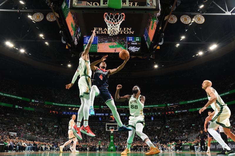 BOSTON, MA - APRIL 14: Jared Butler #4 of the Washington Wizards drives to the basket during the game  against the Boston Celtics on April 14, 2024 at the TD Garden in Boston, Massachusetts. NOTE TO USER: User expressly acknowledges and agrees that, by downloading and or using this photograph, User is consenting to the terms and conditions of the Getty Images License Agreement. Mandatory Copyright Notice: Copyright 2024 NBAE  (Photo by Brian Babineau/NBAE via Getty Images)