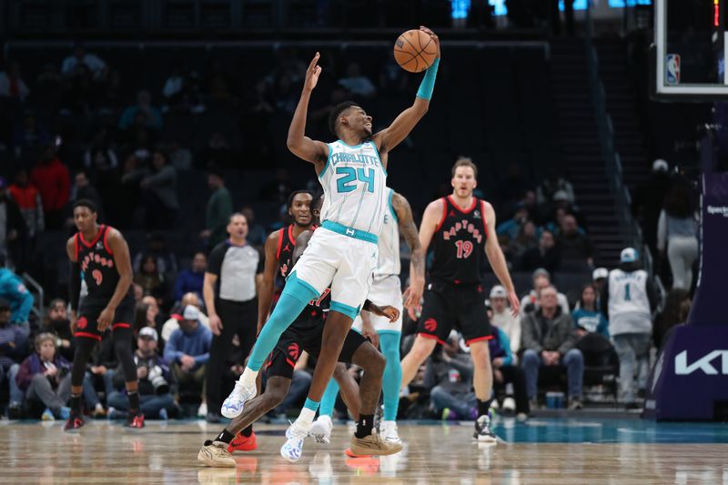 CHARLOTTE, NC - FEBRUARY 7:  Brandon Miller #24 of the Charlotte Hornets handles the ball during the game against the Toronto Raptors on February 7, 2024 at Spectrum Center in Charlotte, North Carolina. NOTE TO USER: User expressly acknowledges and agrees that, by downloading and or using this photograph, User is consenting to the terms and conditions of the Getty Images License Agreement.  Mandatory Copyright Notice:  Copyright 2024 NBAE (Photo by Brock Williams-Smith/NBAE via Getty Images)