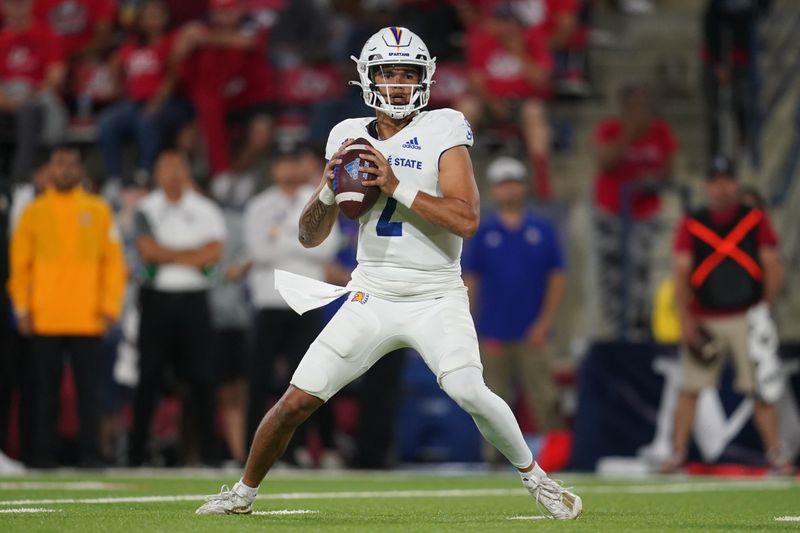 Oct 15, 2022; Fresno, California, USA; San Jose State Spartans quarterback Chevan Cordeiro (2) looks to throw a pass against the Fresno State Bulldogs in the first quarter at Valley Children's Stadium. Mandatory Credit: Cary Edmondson-USA TODAY Sports