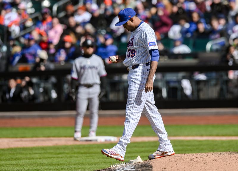 Apr 9, 2025; New York City, New York, USA; New York Mets pitcher Edwin DÌaz (39) reacts after giving up a walk during the ninth inning against the Miami Marlins at Citi Field. Mandatory Credit: John Jones-Imagn Images