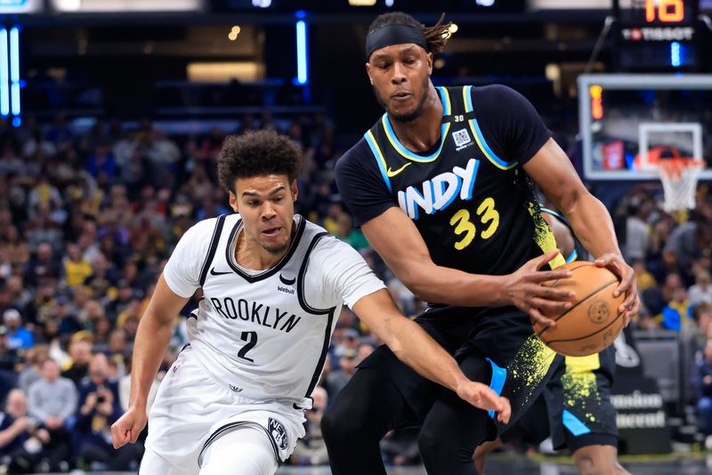 INDIANAPOLIS, INDIANA - MARCH 16: Cameron Johnson #2 of the Brooklyn Nets attempts to steal the ball from Myles Turner #33 of the Indiana Pacers during the first half at Gainbridge Fieldhouse on March 16, 2024 in Indianapolis, Indiana. NOTE TO USER: User expressly acknowledges and agrees that, by downloading and or using this photograph, User is consenting to the terms and conditions of the Getty Images License Agreement. (Photo by Justin Casterline/Getty Images)